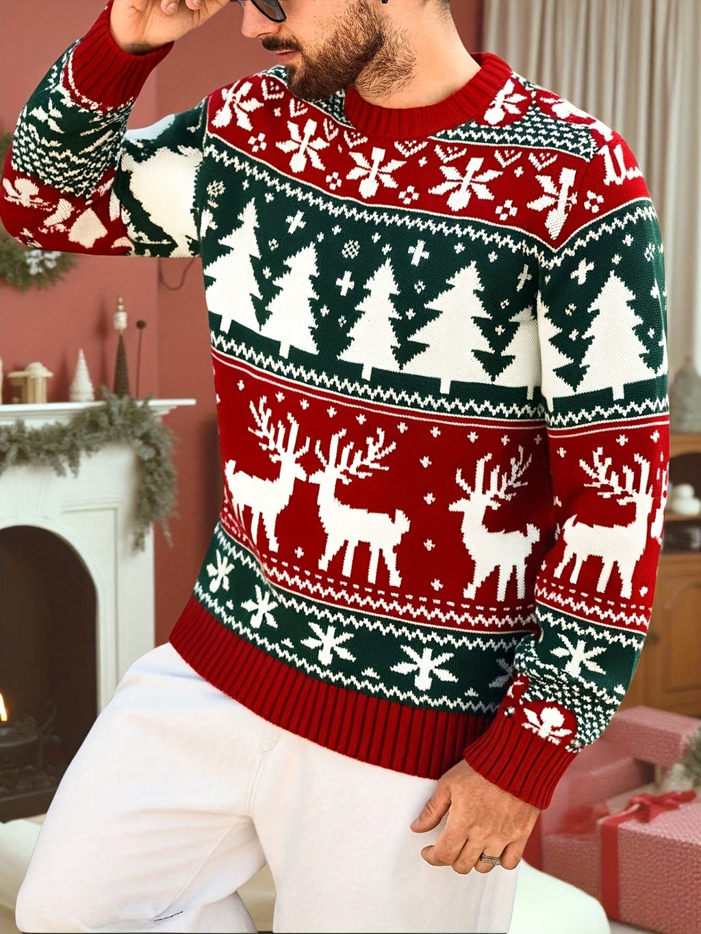 Mens Christmas sweater in Red with reindeer pattern, worn with white pants