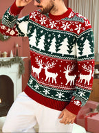 Mens Christmas sweater in Red with reindeer pattern, worn with white pants