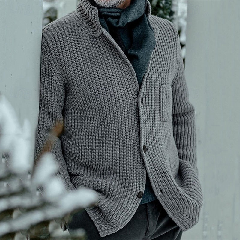 Mens cardigan in Gray chunky rib knit, worn buttoned over a dark shirt