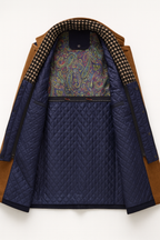 Mens overcoat in Navy, inside view of the quilted lining