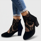 Womens lace booties with block heel in Black, worn, side view