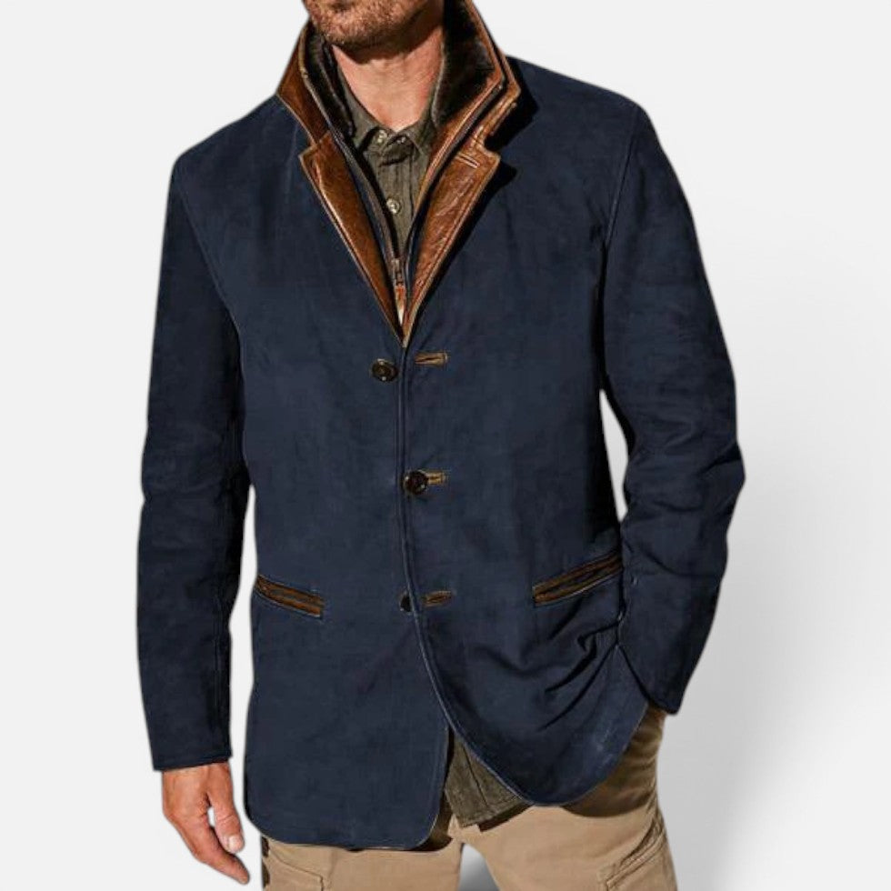 Casual blazer for men with a leather trim collar, worn over a knit with the trim collar folded down
