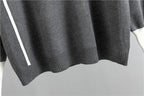 Womens tracksuit with contrast stripe trim in Gray, close-up of the stripe and hem