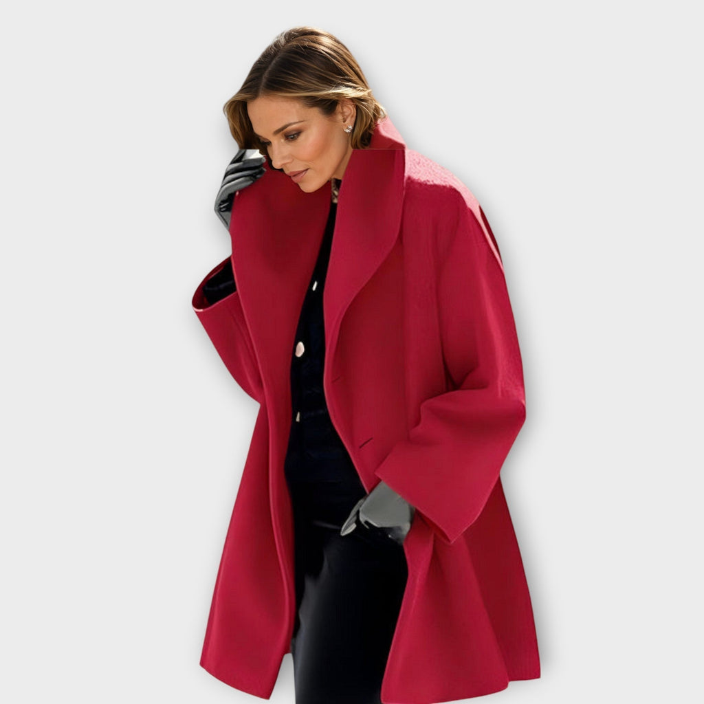 Womens wool coat with shawl collar in Red, swing cut, worn open over dark knitwear