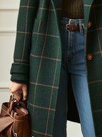 Womens plaid wool blend coat in Green, close-up of the cuff and hem