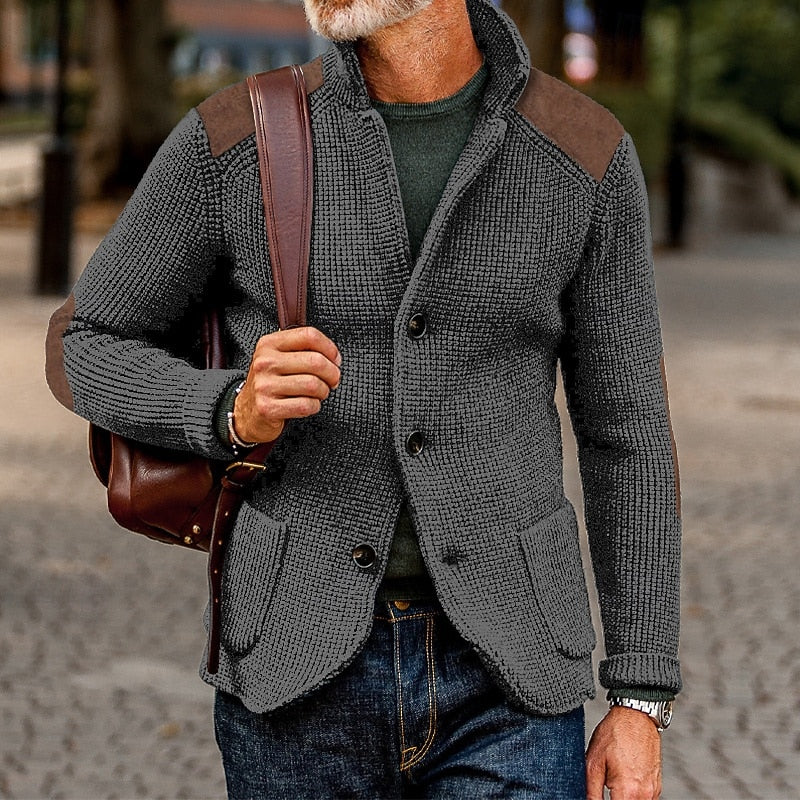 Mens cardigan with stand collar and shoulder patches, shown in gray