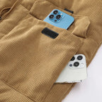 Corduroy puffer vest in Tan, close-up of the flap pocket and corduroy
