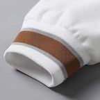Varsity jacket in White, close-up of the striped ribbed cuff