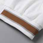 Varsity jacket in White, close-up of the striped ribbed hem