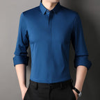 Mens dress shirt in Blue, front view with sleeves rolled