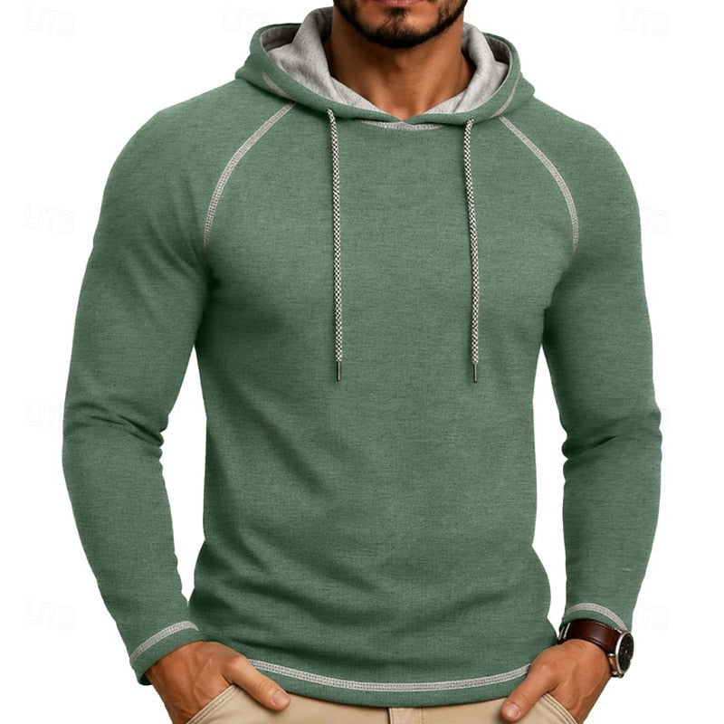 Mens pullover hoodie in Green with contrast stitching, worn