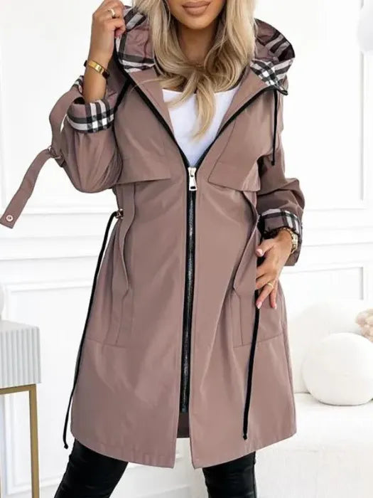 Womens waterproof jacket, long hooded zip style with drawstring waist, front view