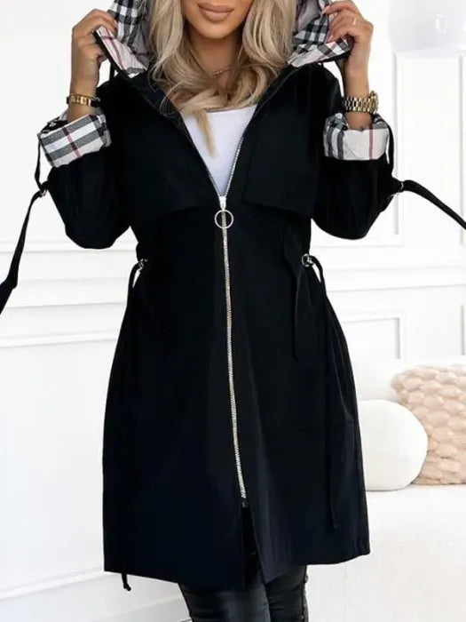 Womens waterproof jacket in Black with plaid hood lining and cuffs