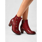 Womens ankle boots in Burgundy, worn, side view