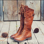 Womens knee high boots in Brown with full lace up front and buckle strap