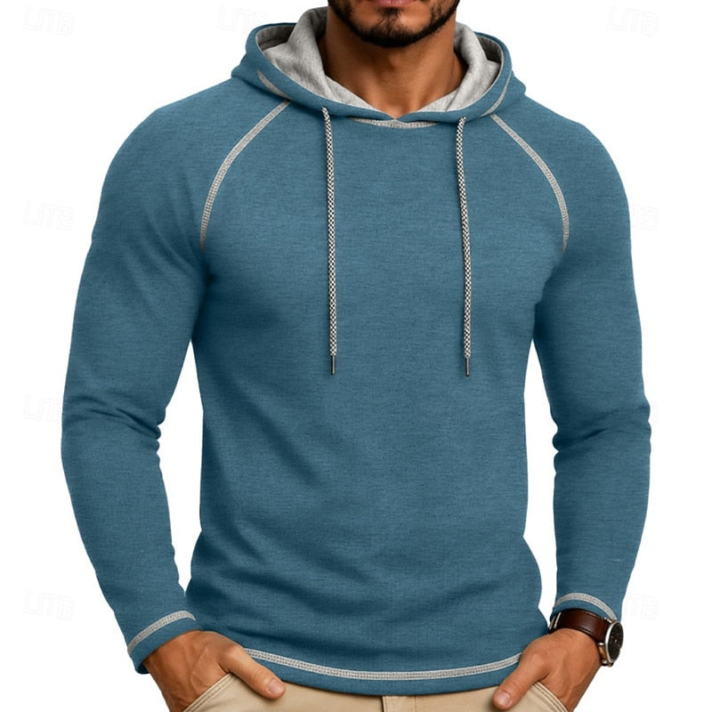 Mens pullover hoodie in Blue with contrast stitching, worn